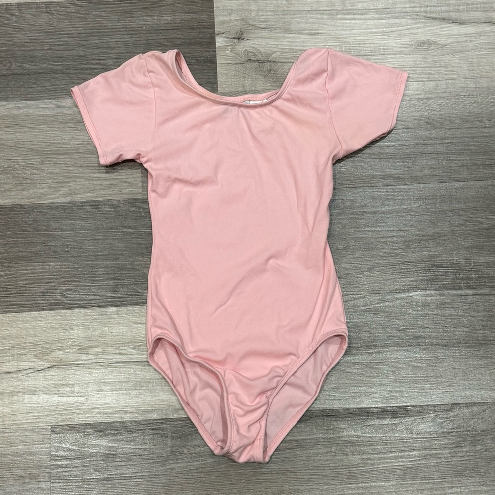 Girls  Pink leotard by Jacques Moret  size large 12/14